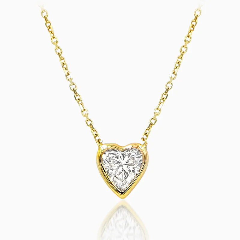 Long Dainty Necklaces For Subtle Elegance-Bezel Set Petite Heart Shaped Diamond Pendent set in 14kt Gold