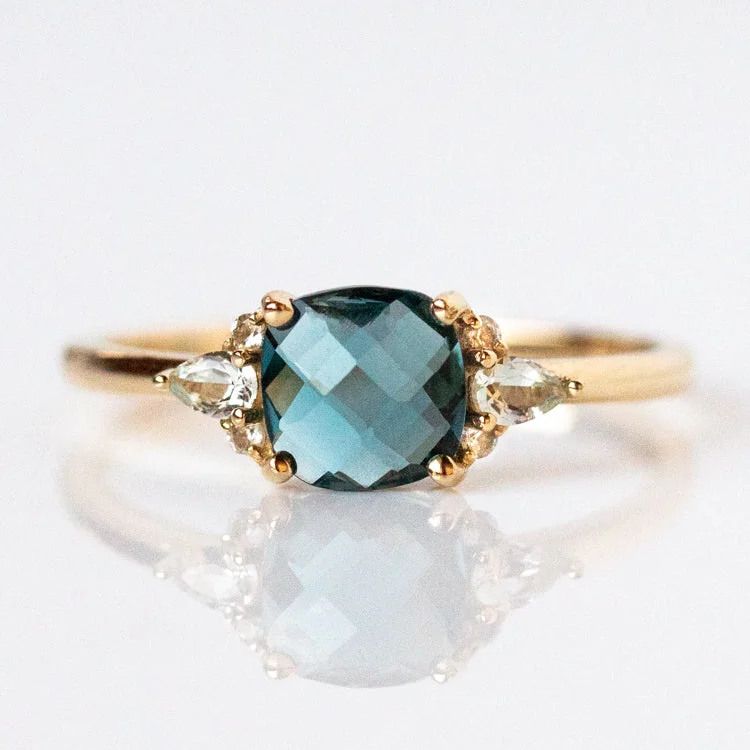 Women’s Fashion Rings For Every Occasion-14k Blue Topaz and White Sapphire Ring