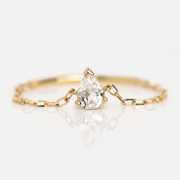 Stunning Gold Engagement Rings For Brides-Solid Gold White Topaz Pear Chain Ring